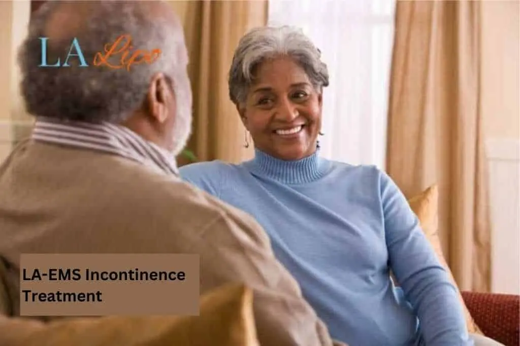 Couple sat smiling at each other - LA-EMS treatment Burton upon Trent