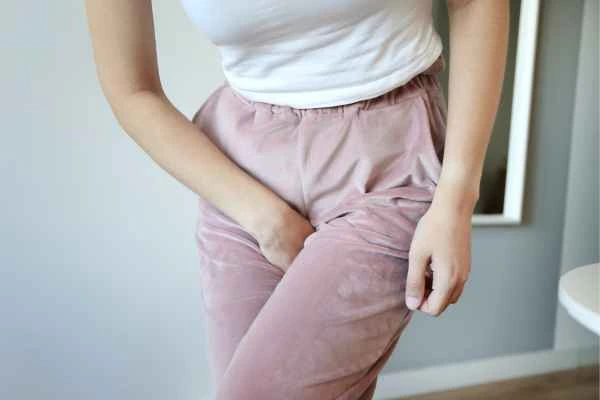 woman struggling with urine incontinence Burton upon Trent